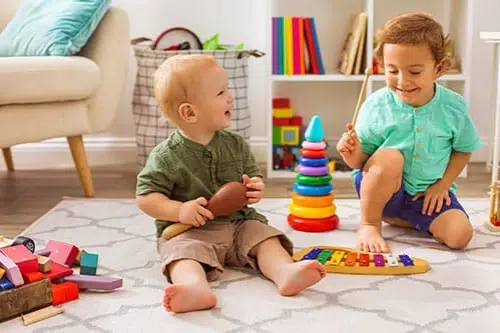 2 toddlers playing at early learning centre