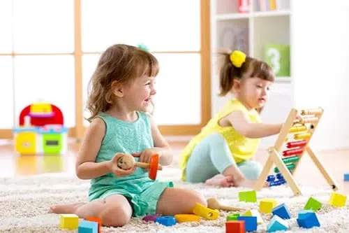 2 toddlers playing at early learning centre