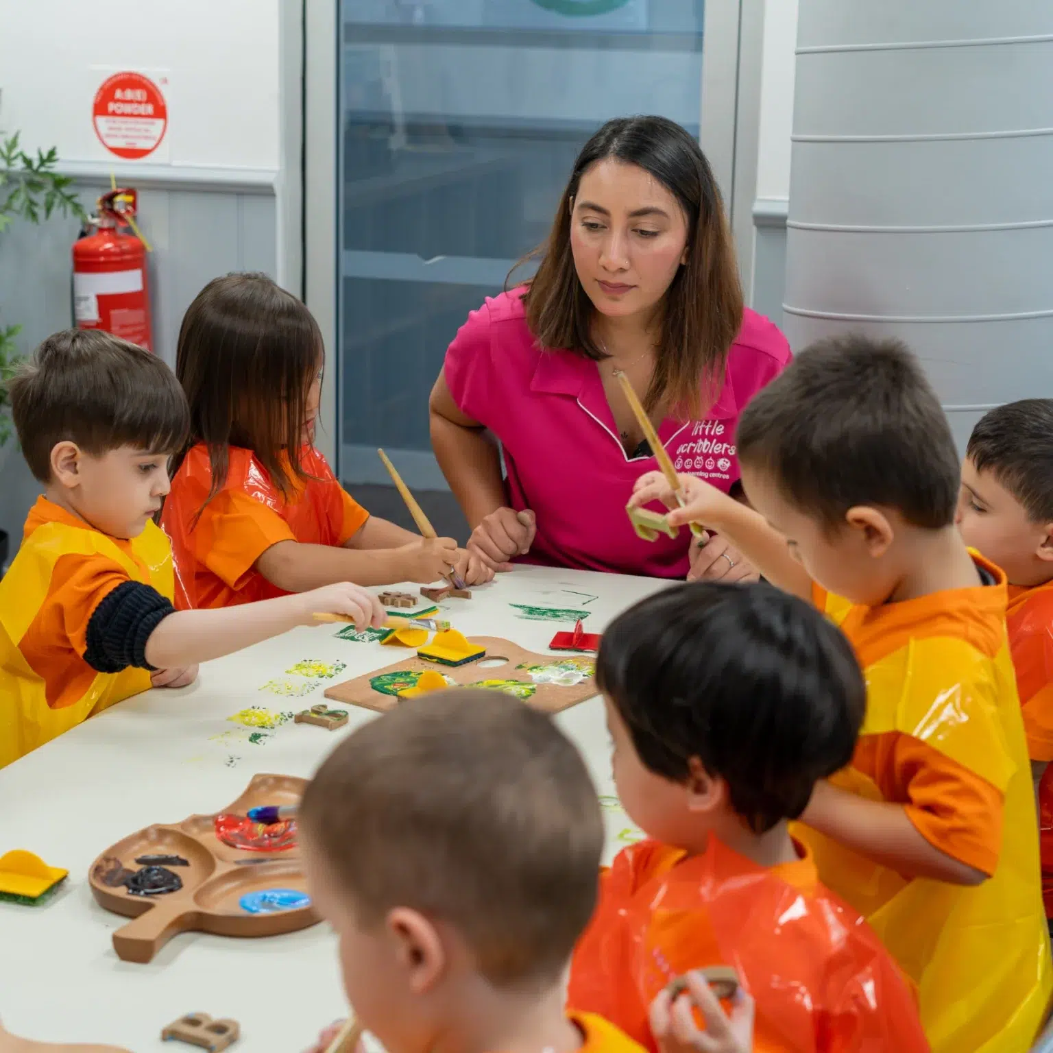 Kids playing with toy at Little Scribblers Early Learning Centre